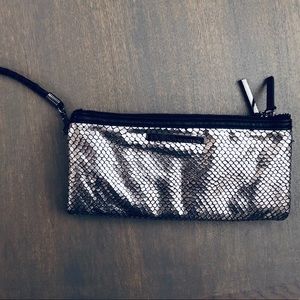 BCBG metallic wristlet clutch expandable